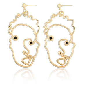 Gold Tone Face Dangle  Earrings