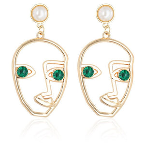 Gold Tone Face Dangle  Earrings