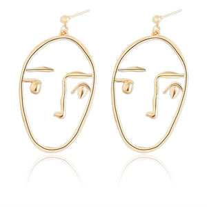 Gold Tone Face Dangle  Earrings