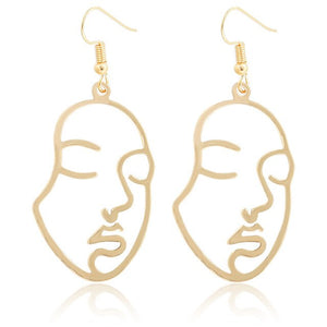Gold Tone Face Dangle  Earrings