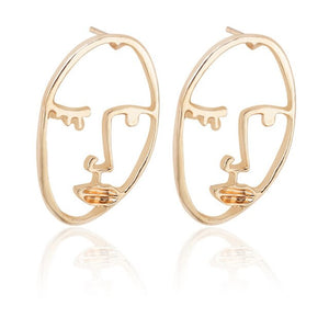 Gold Tone Face Dangle  Earrings